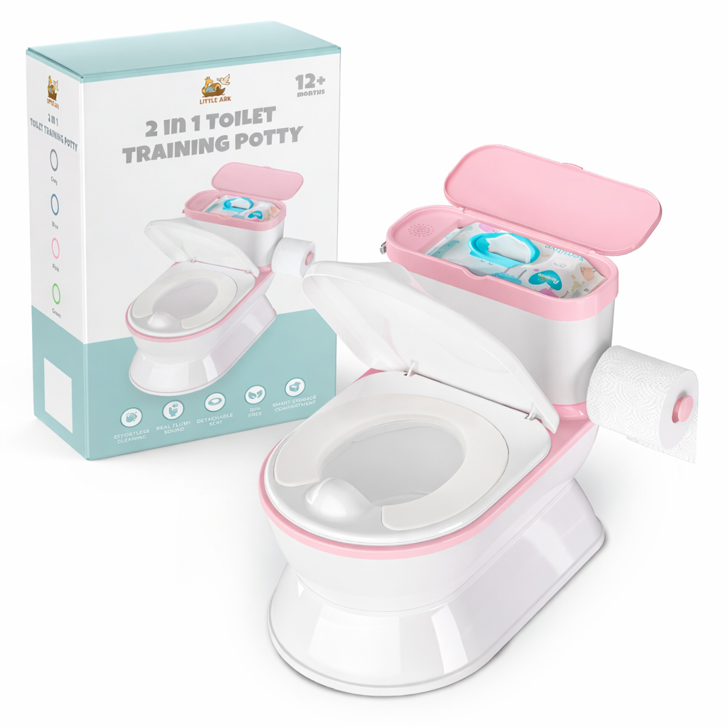 A pink and white 2-in-1 toilet training potty shown with its retail box on a white background. The potty has an open lid revealing a storage compartment with diapers, a side-mounted toilet paper holder with a roll, and a seat cover on the seat.